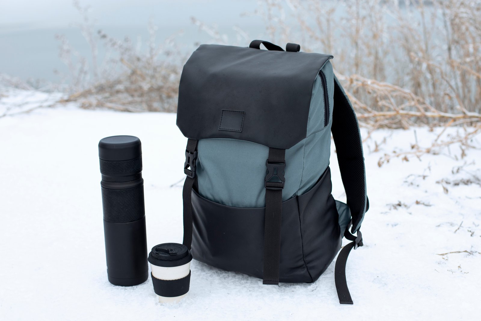 roadtrip-concept-with-backpack-flask